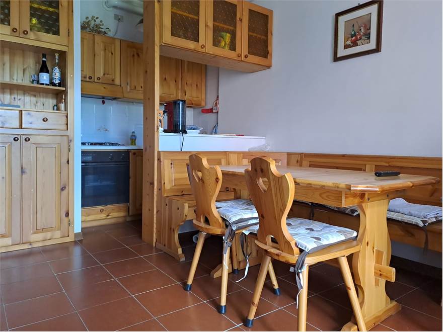 Soggiorno con cucina a vista