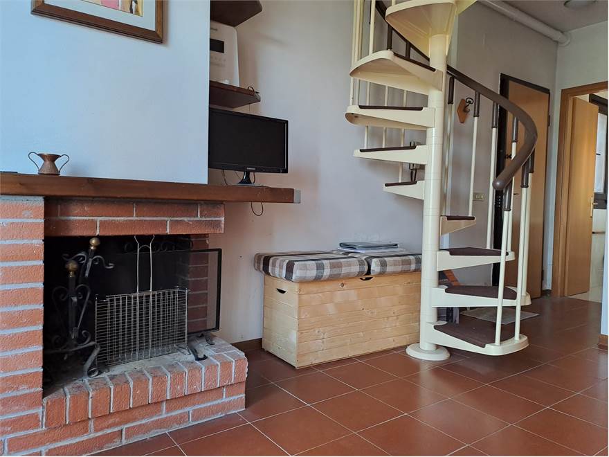 Soggiorno con cucina a vista